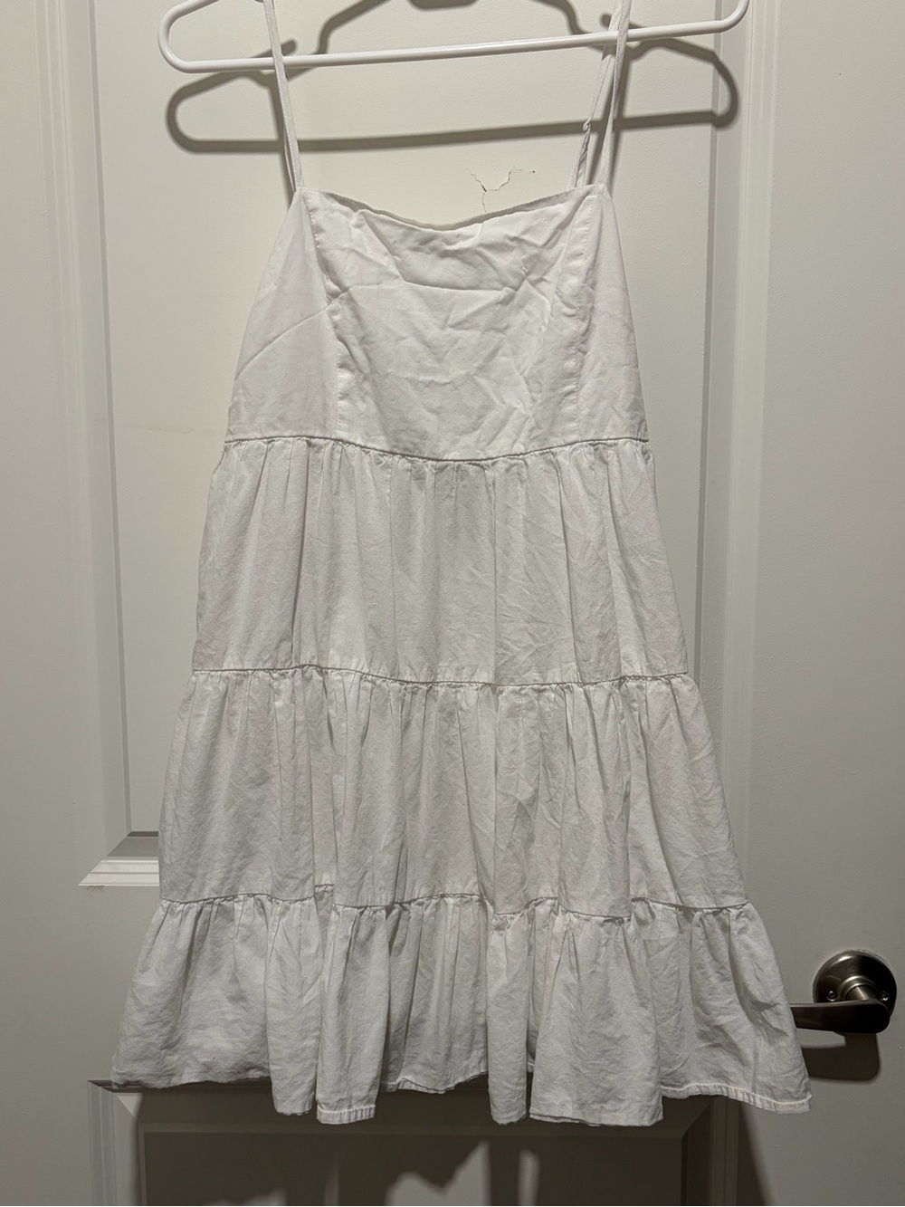 Blue Rain x Francescaās white tiered mini dress